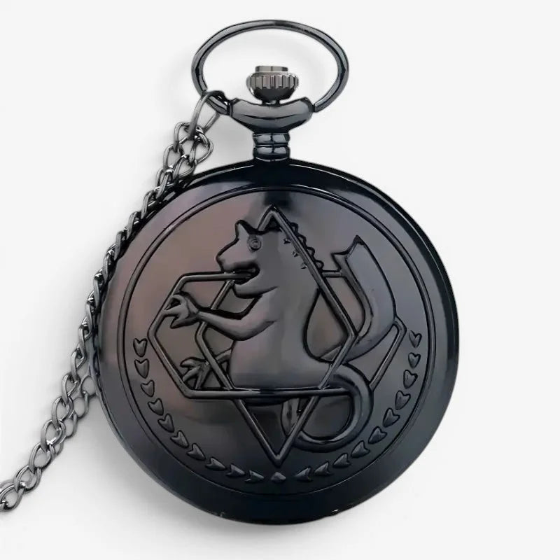 Black metallic alchemist pocket watch with embossed stylized creature inside geometric frame and heart motifs border