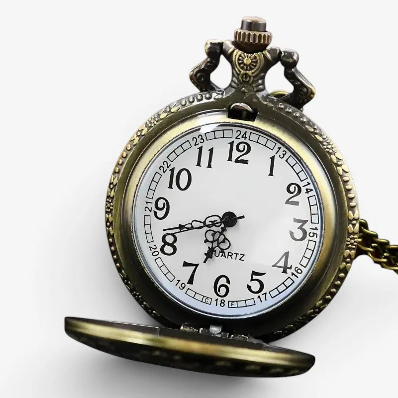 Antique brass-finished alice in wonderland pocket watch with white face black numerals hands and ornate crown