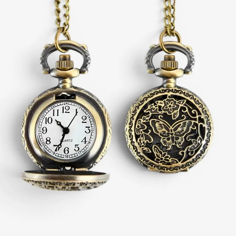 Antique butterfly pocket watch brass back side with butterfly and floral engraving white face black numerals