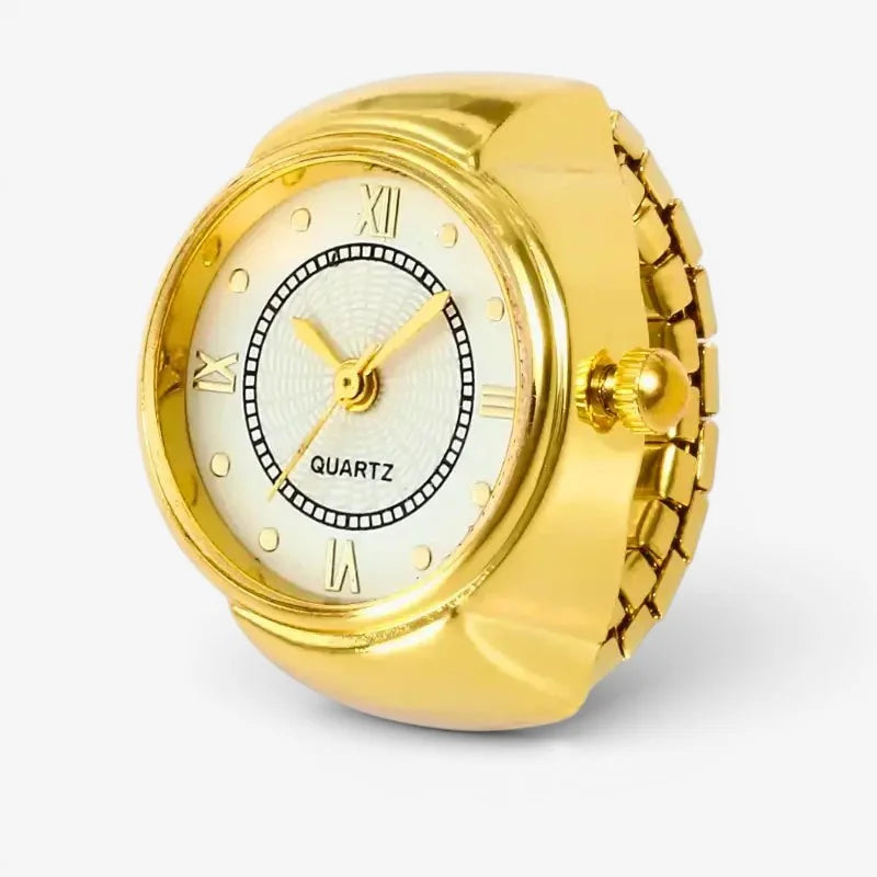 Antique gold ring watch with gold-toned band, white dial, roman numerals, and quartz movement