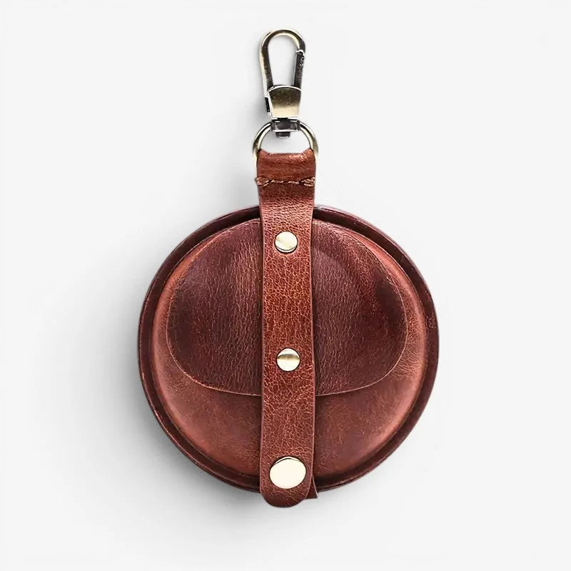 Brown leather antique pocket watch case keychain with silver metal clasp and three metallic studs along the strap
