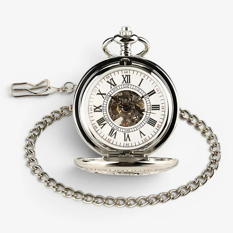 Antique silver pocket watch with roman numerals and visible mechanical movement attached to matching chain