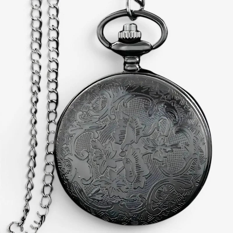 Black dragon pocket watch with black ornate floral engraving and matching chain made of metal