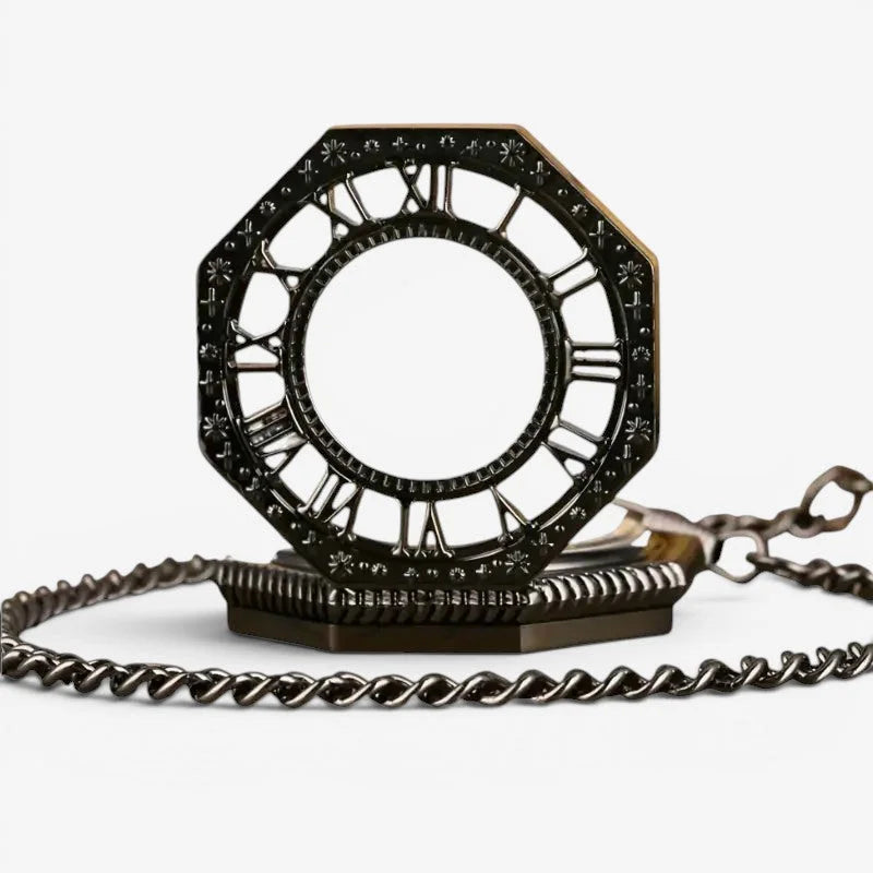 Black steampunk pocket watch with black octagonal case roman numerals and ornate detailing on twisted metal chain