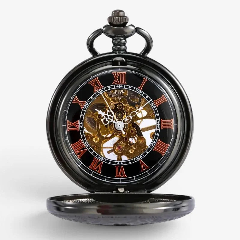 Black vintage pocket watch with a visible golden skeletonized movement red roman numerals and ornate winding crown