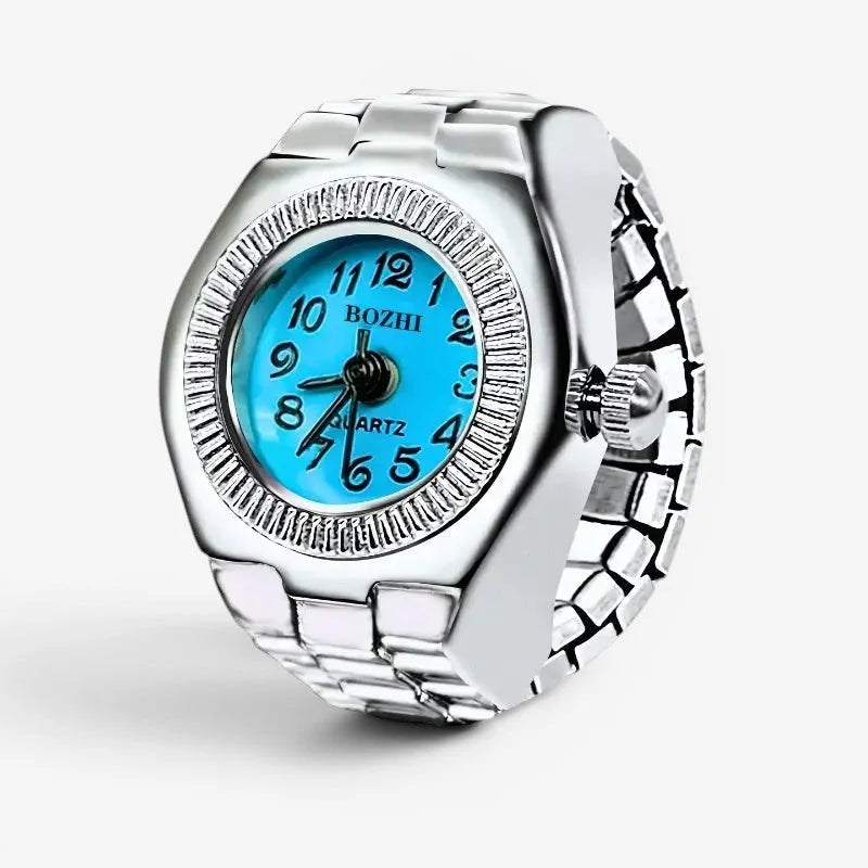 Silver-toned quartz ring watch with bright blue face black numerals and adjustable metal band called blue ring watch