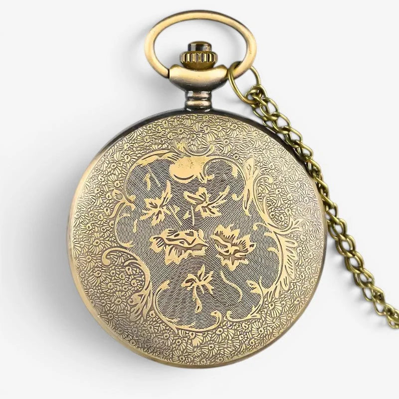 Antique-style brass boat pocket watch with intricate floral engravings and matching chain for vintage style use