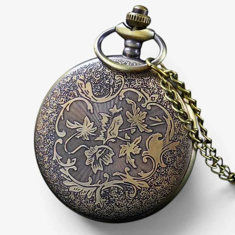 Bronze dragon pocket watch in antique brass with intricate floral engravings and matching chain for vintage style use