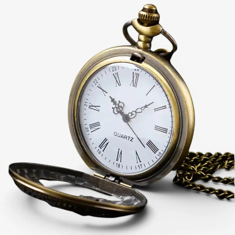 Bronze dragon pocket watch with antique brass case white face black roman numerals and ornate silver hands