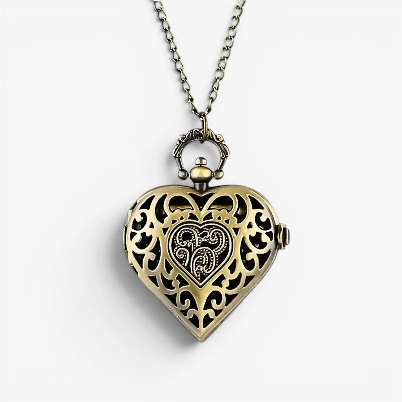 Bronze pendant watch with antique brass heart-shaped locket featuring intricate filigree and engraved paisley motif