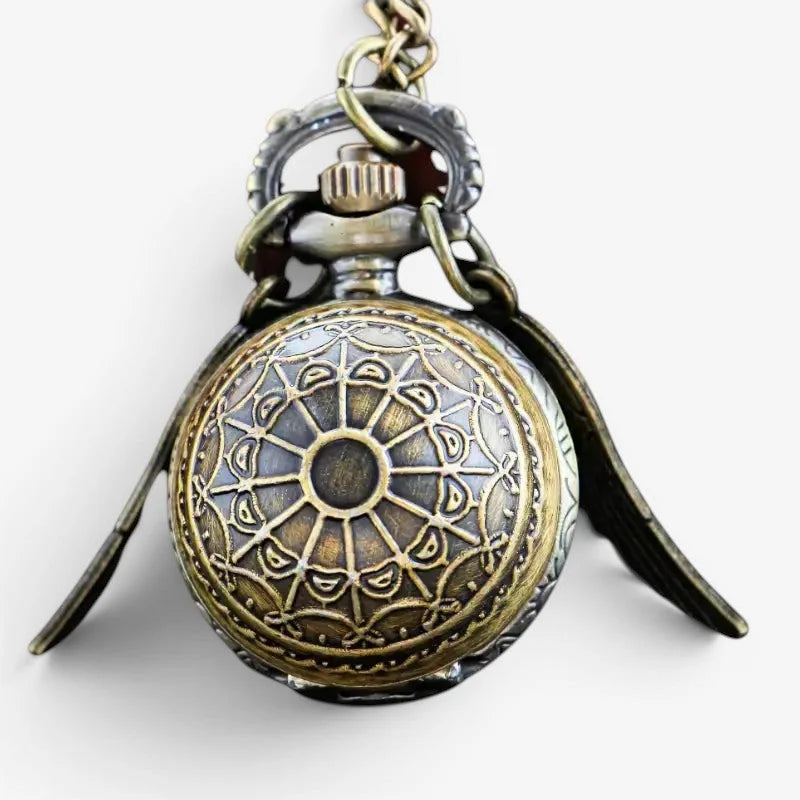 Bronze Snitch pocket watch pendant in antique brass finish with intricate filigree design and wing-shaped side accents