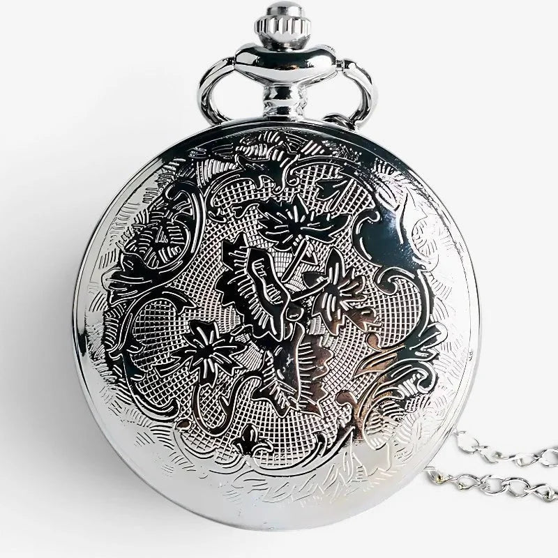 Butler pocket watch silver with intricate floral and vine engraving and polished metallic finish on circular face attached chain