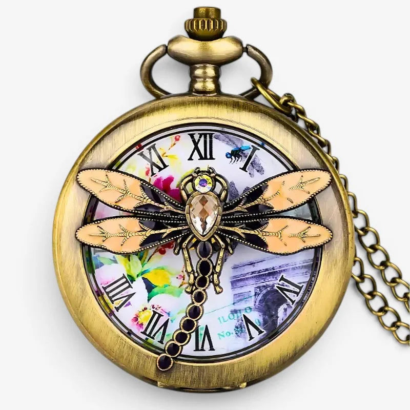 Antique brass butterfly pocket watch with detailed dragonfly centerpiece featuring peach and black gemstone wings