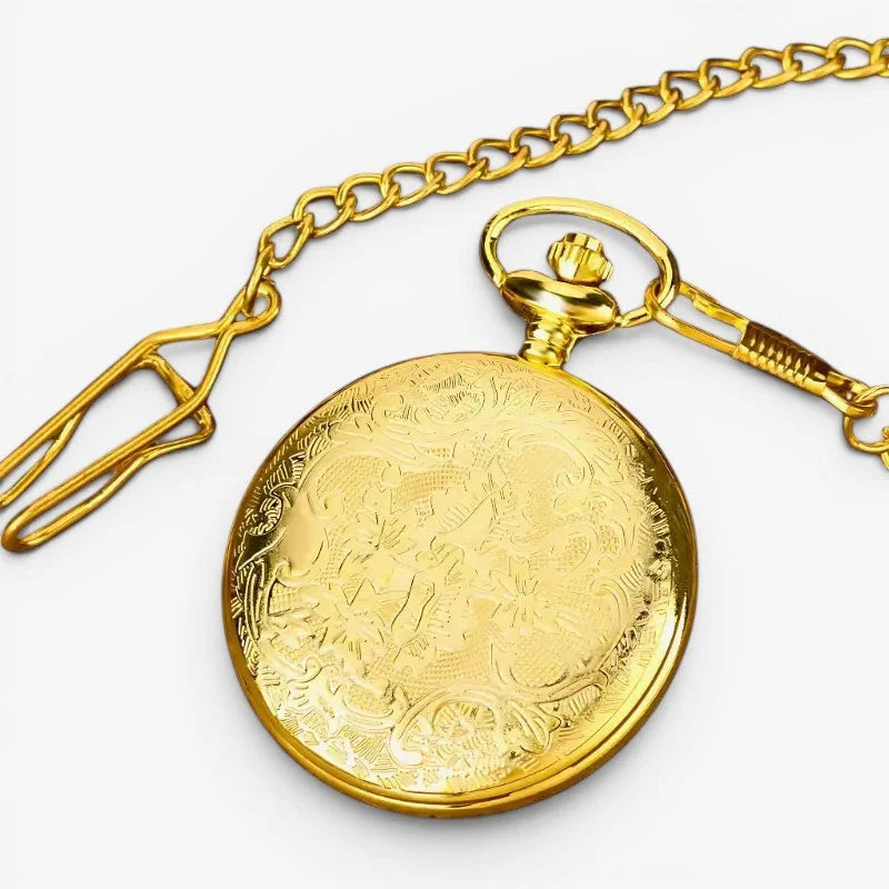 Golden butterfly pocket watch with intricate engraved floral design and matching gold chain for classic style