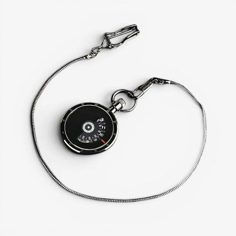 Black circular modern pocket watch with silver-toned chain clasp and white numerals on face