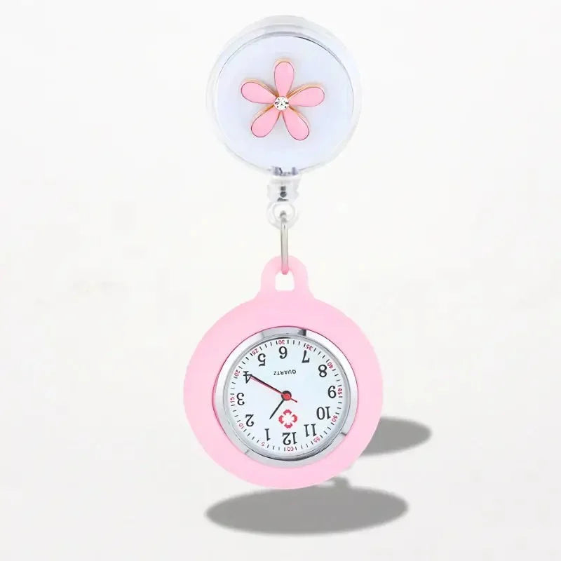 Pink silicone clip on nurse watch with retractable clip and pink flower design for easy attachment