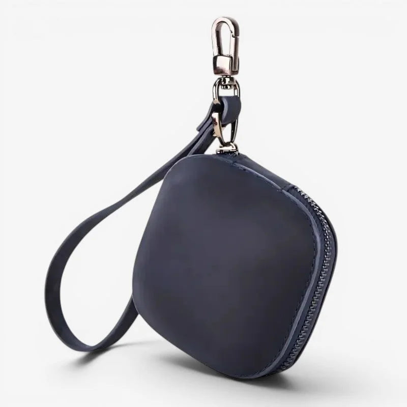 Dark navy blue cowhide pocket watch case wristlet with silver metal clasp and zipper made of leather