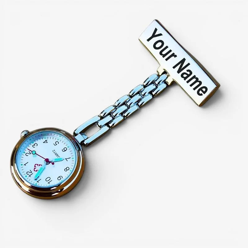Customizable nurse watch with silver tone, light blue face, gold-tone bezel, and engraved nameplate at the top