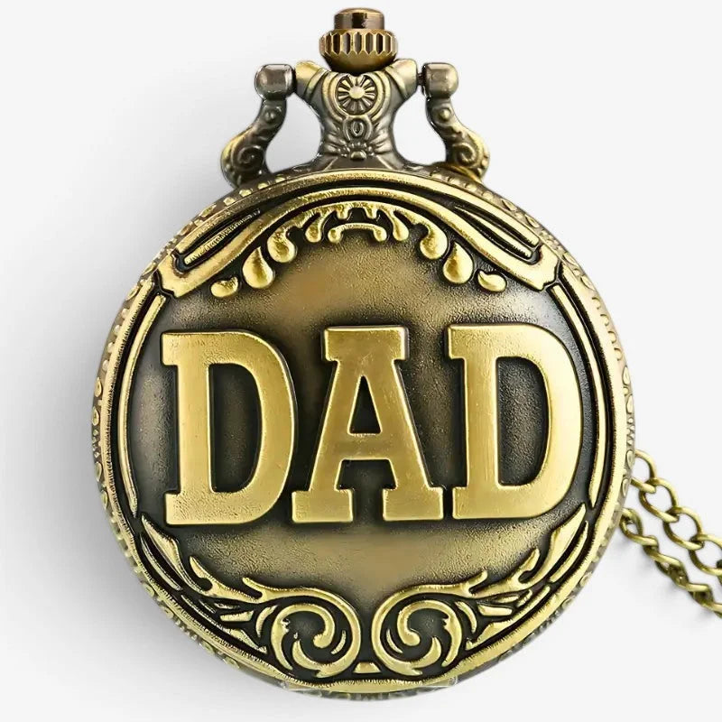 Antique brass dad pocket watch pendant with raised dad lettering and ornate scrollwork design