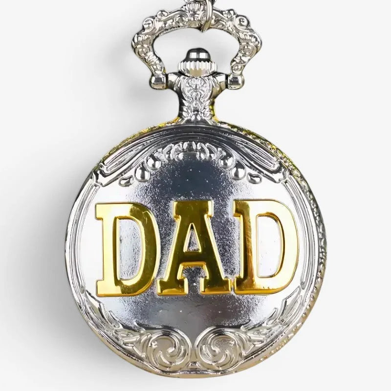 Silver and gold two-tone dad pocket watch with ornate detailing and bold gold lettering on its face