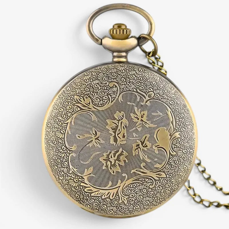 Antique brass Donald Duck pocket watch with intricate floral engravings and a matching chain