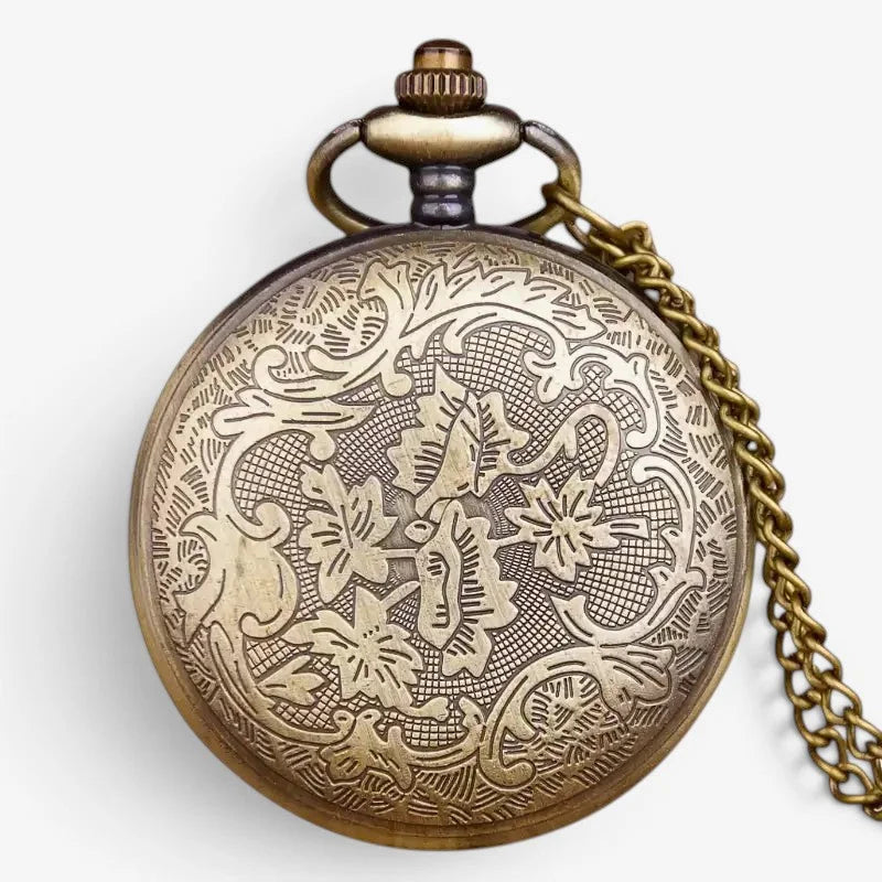 Antique brass dragon design pocket watch with intricate floral engravings and matching chain in vintage style