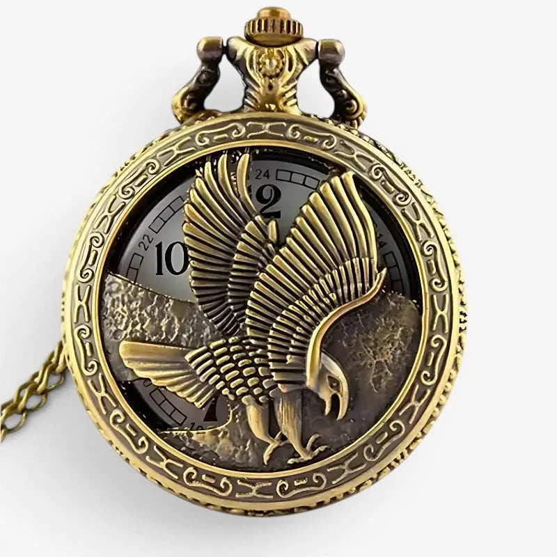 Antique gold-toned eagle pocket watch with detailed feather design and ornate scrollwork border
