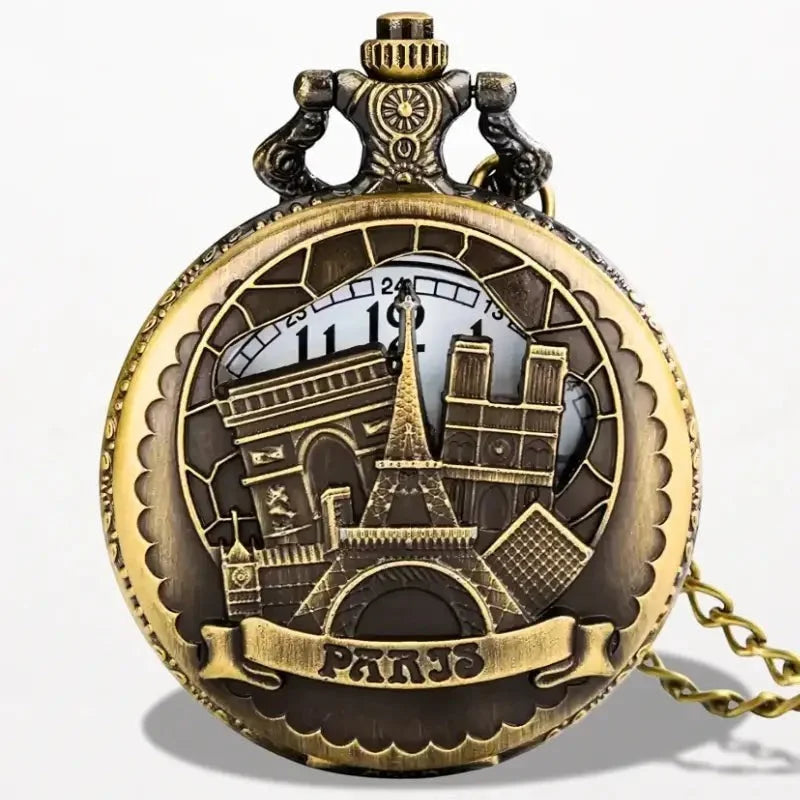Antique brass-colored Eiffel Tower pocket watch with intricate Parisian landmarks design and attached chain