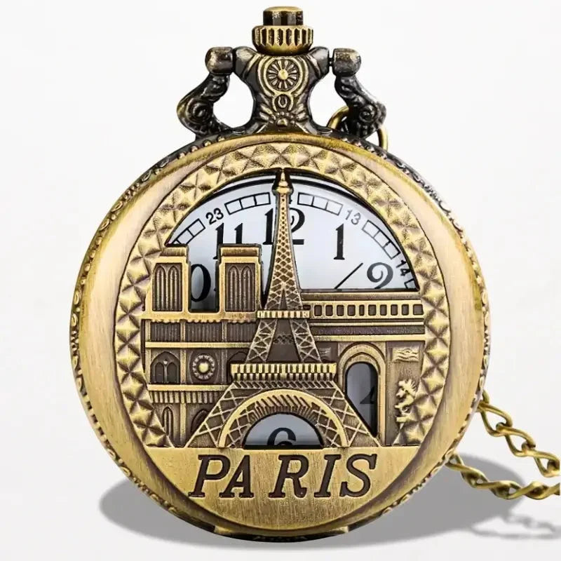 Antique gold-toned Eiffel Tower pocket watch with intricate Parisian landmarks design and Paris engraving on front