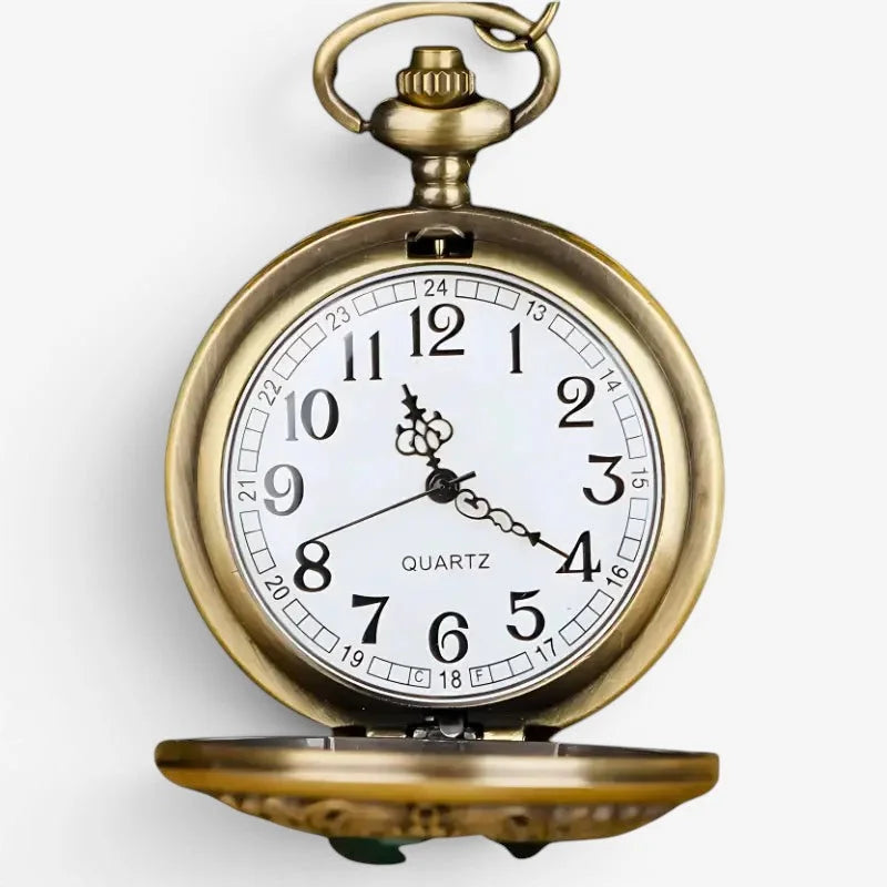 Antique brass finished emerald pocket watch with white face black arabic numerals and quartz movement