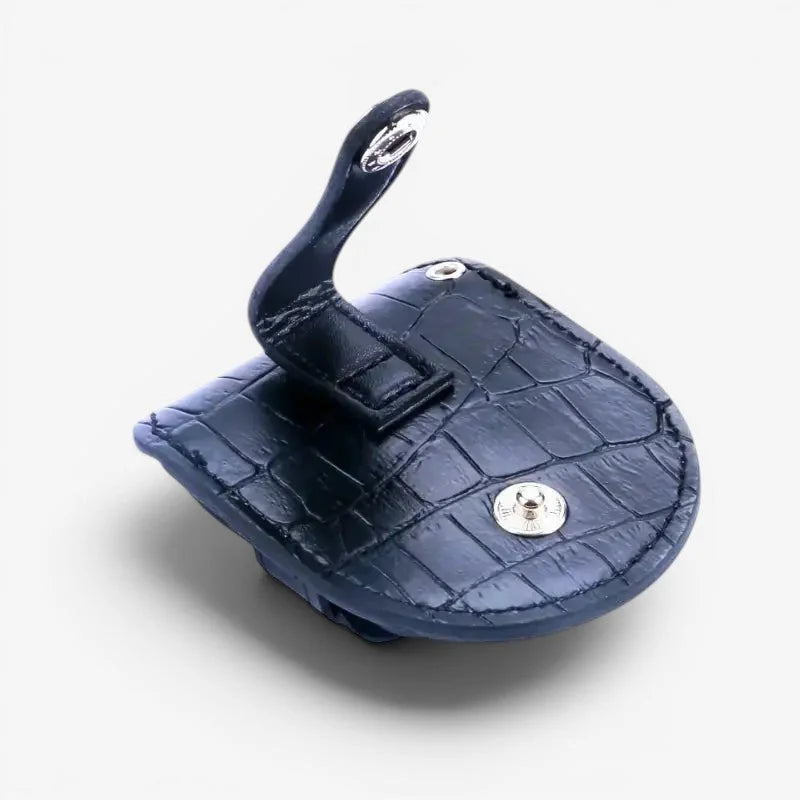 Empty pocket watch case in dark blue crocodile-embossed leather with silver snap button and matching strap