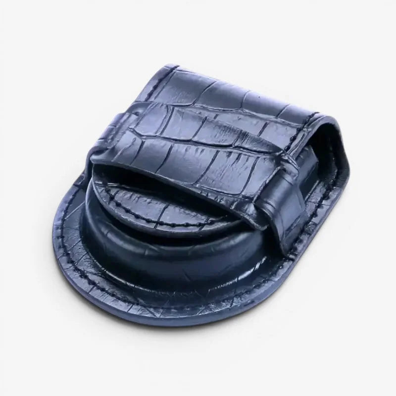 Dark blue crocodile leather watch strap holder with textured surface and precise stitching for empty pocket watch case