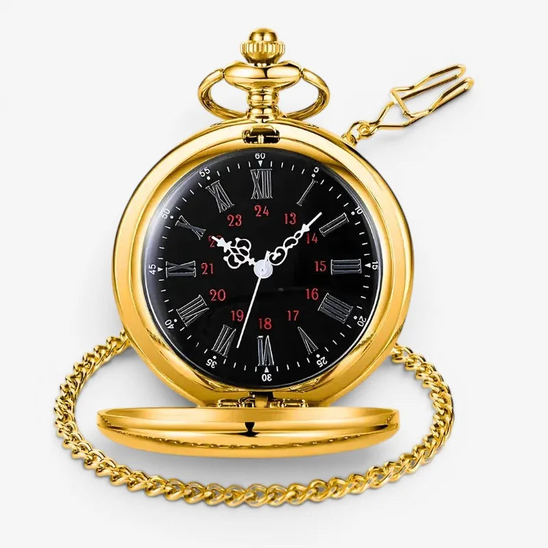 Engraved gold pocket watch with black face roman numerals in white and red and attached gold chain
