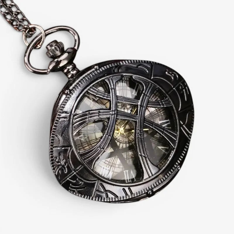 Black ornate eye of agamotto pocket watch with visible mechanical interior roman numerals and infinity gauntlet design