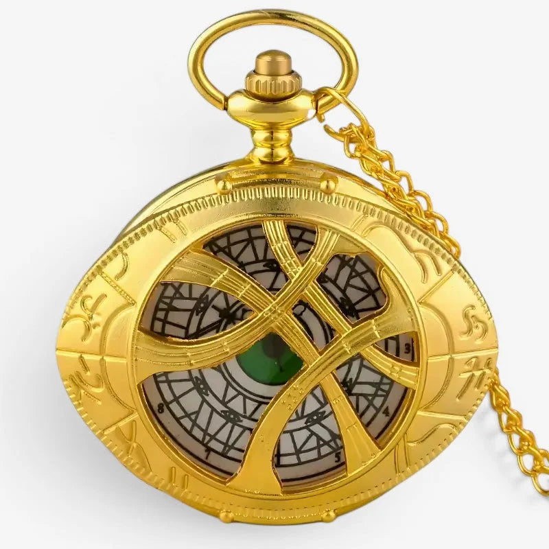 Golden eye of agamotto pocket watch with intricate gear design and central green eye motif in metal casing