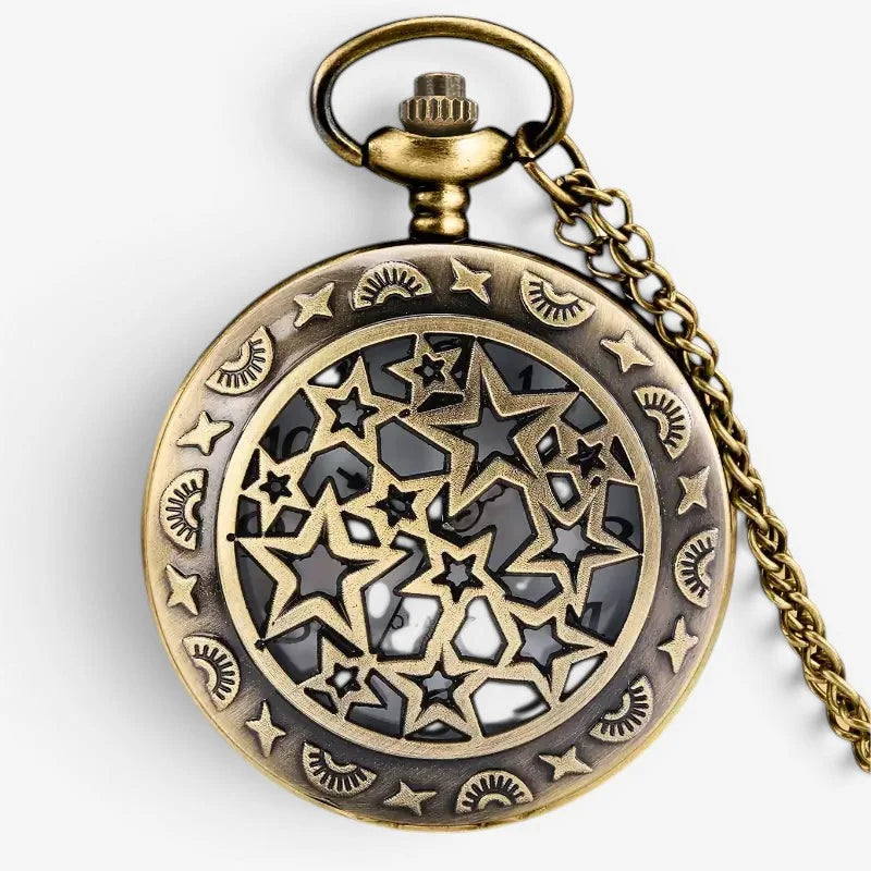 Antique brass fantasy pocket watch with intricate star and crescent moon cutout design and matching chain