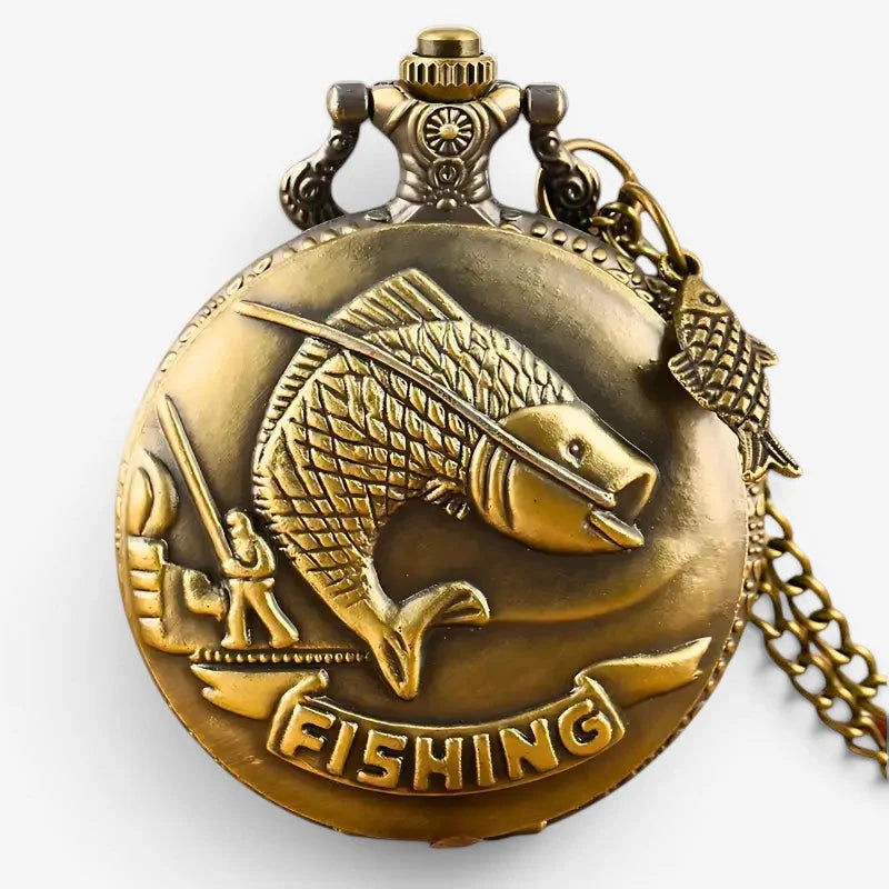 Antique brass fisherman pocket watch with detailed fishing-themed engraved fish, angler, and fishing banner design