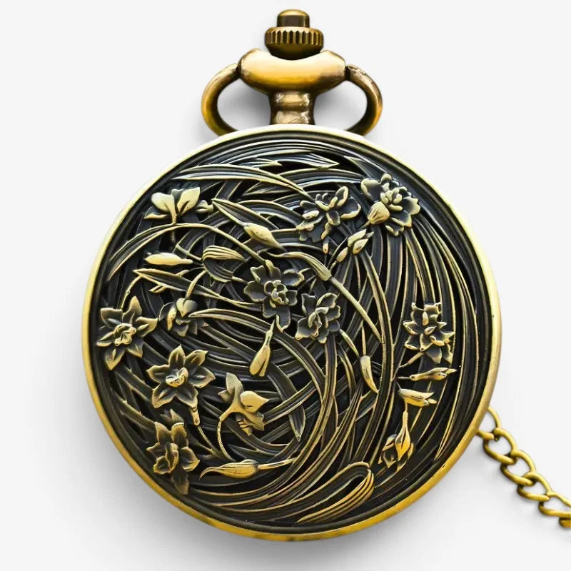 Antique brass floral pocket watch with intricate engraving and matching chain for elegant timekeeping