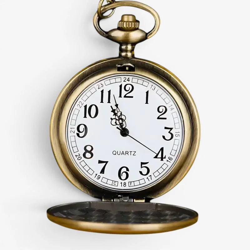 Antique brass forest deer pocket watch with white dial black arabic numerals and quartz movement visible below 12