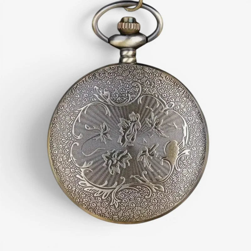 Antique-style silver forest deer pocket watch with intricate floral and scrollwork engraving on circular face