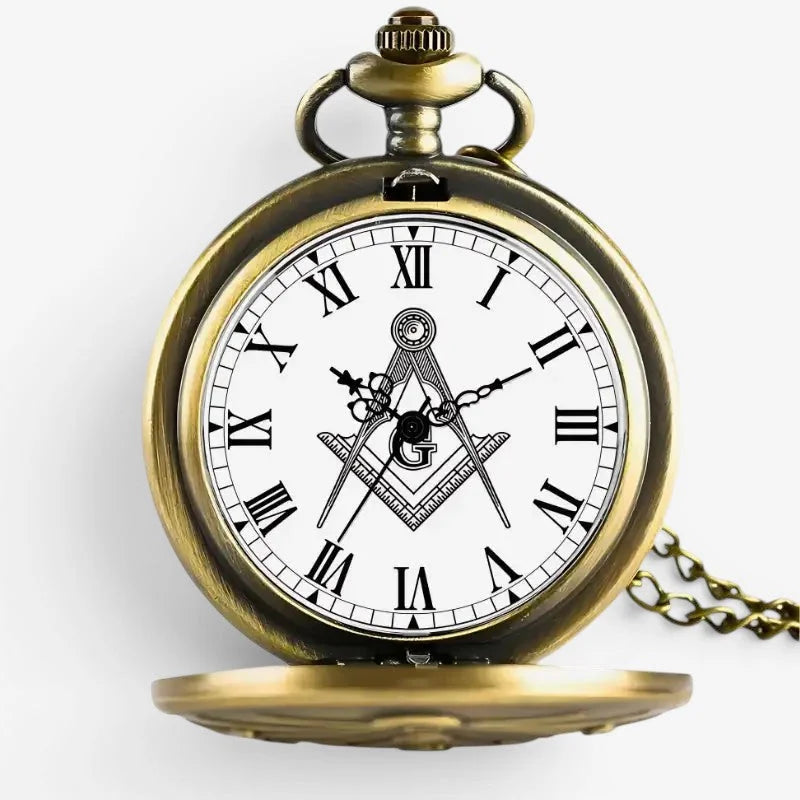 Antique brass-finished Free Mason pocket watch with white face black roman numerals and engraved masonic emblem