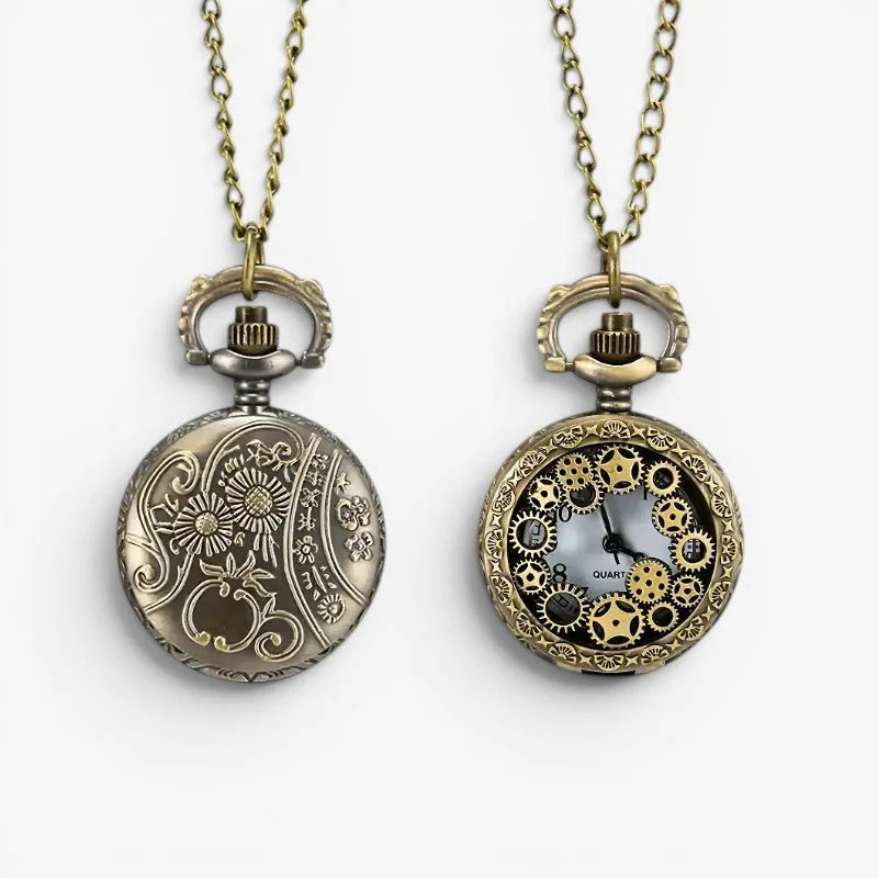 Two vintage-style gear necklace pocket watches one with floral engraving and one with exposed golden gears on chains