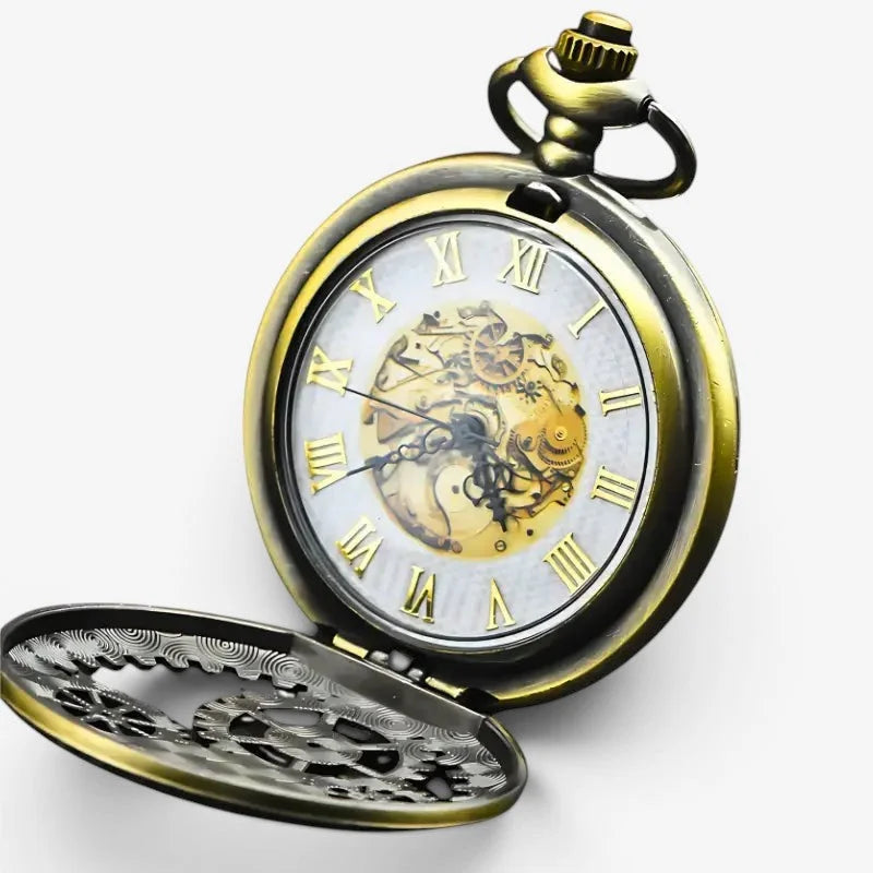 Antique brass-finished gear pocket watch with visible internal gears and roman numeral markings on white face