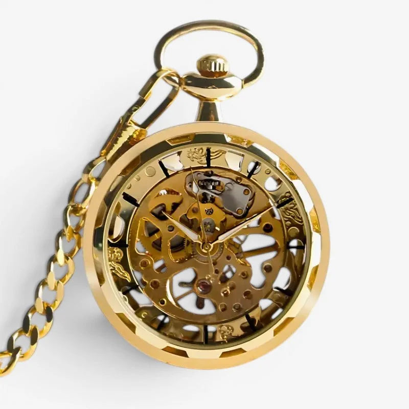 Gold mechanical skeleton pocket watch with intricate gearwork and matching chain in a polished golden finish