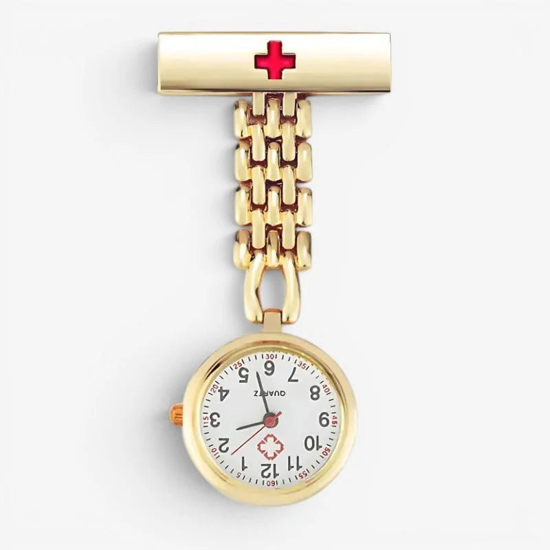 Gold nurse watch with a gold-colored pin, red cross emblem, and white face featuring black numerals