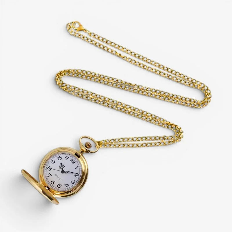 Gold pocket watch pendant with a gold-toned case white face black numerals hands and an ornate gold chain