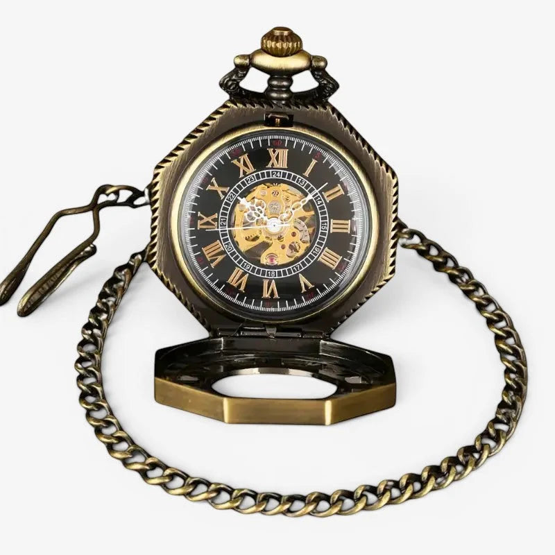 Antique brass-finished gold steampunk pocket watch with octagonal shape black face roman numerals and visible golden gears