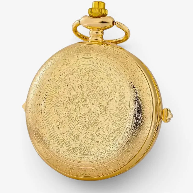Golden hourglass pocket watch with intricate floral engravings on circular face and polished brass finish in hinged design