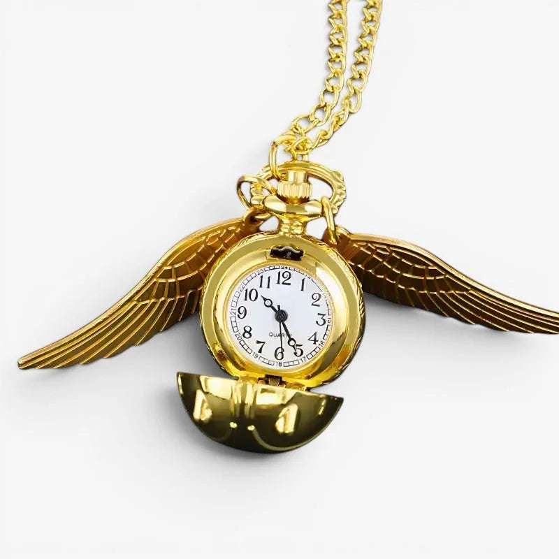 Golden Snitch pocket watch with winged design gold case white face and black numerals on matching gold chain