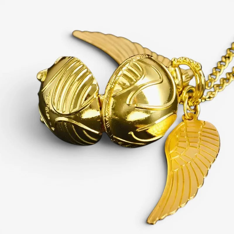 Golden snitch pocket watch locket necklace in gold with intricate engravings and matching chain